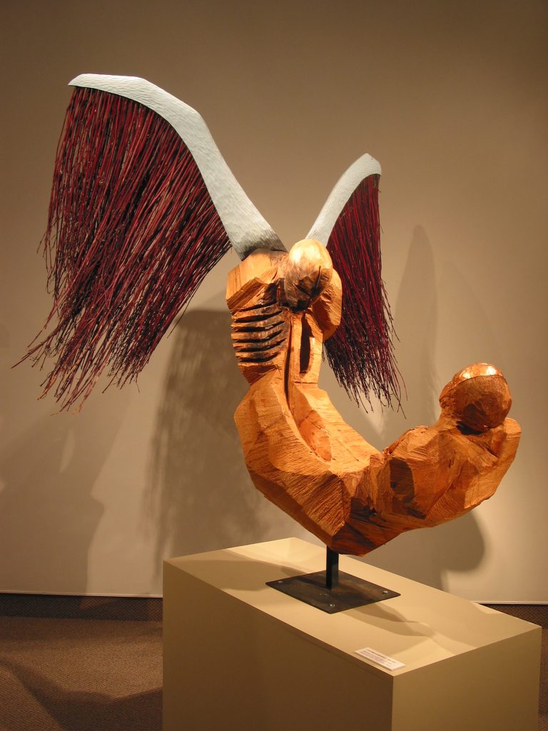 Édith Croft, Les âmes siamoises I, 2001
Musée d’art contemporain de Baie-St-Paul
Bois de cèdre rouge, branches de cornouiller, cuivre, effets brûlés et teinture
Dimensions : hauteur de 123 cm, largeur de 185 cm, profondeur de 225 cm